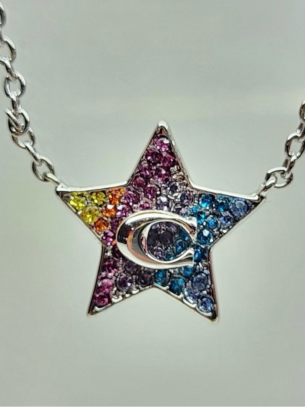 COACH C rhinestone rainbow silver necklace